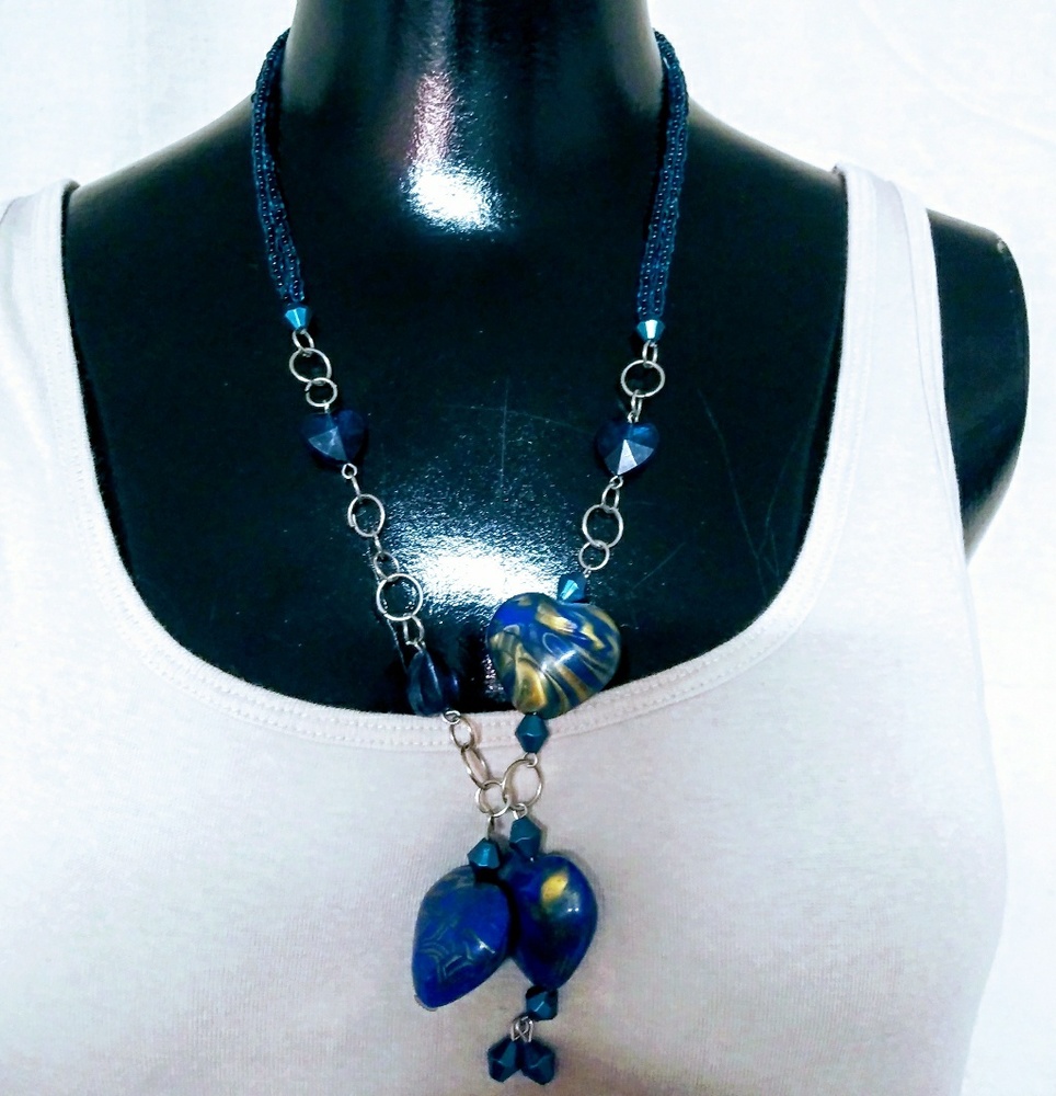 Faux beaded and Charmed necklace.